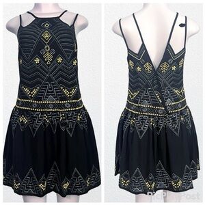 Black beaded mini dress from Free People.
